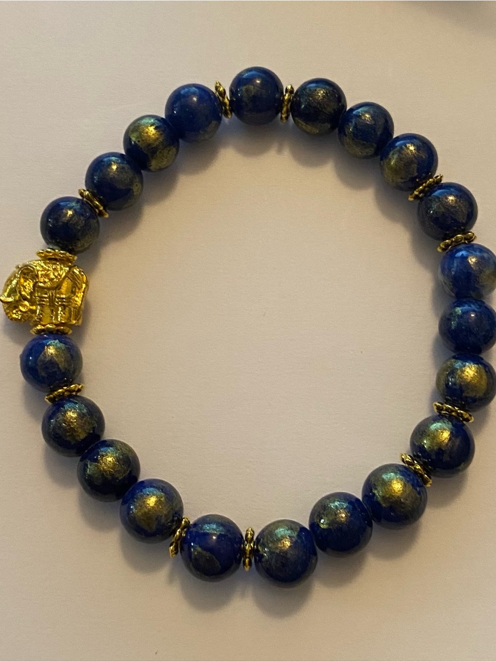 Handcrafted Blue and Gold Jade Stretch Bracelet with Elephant Charm